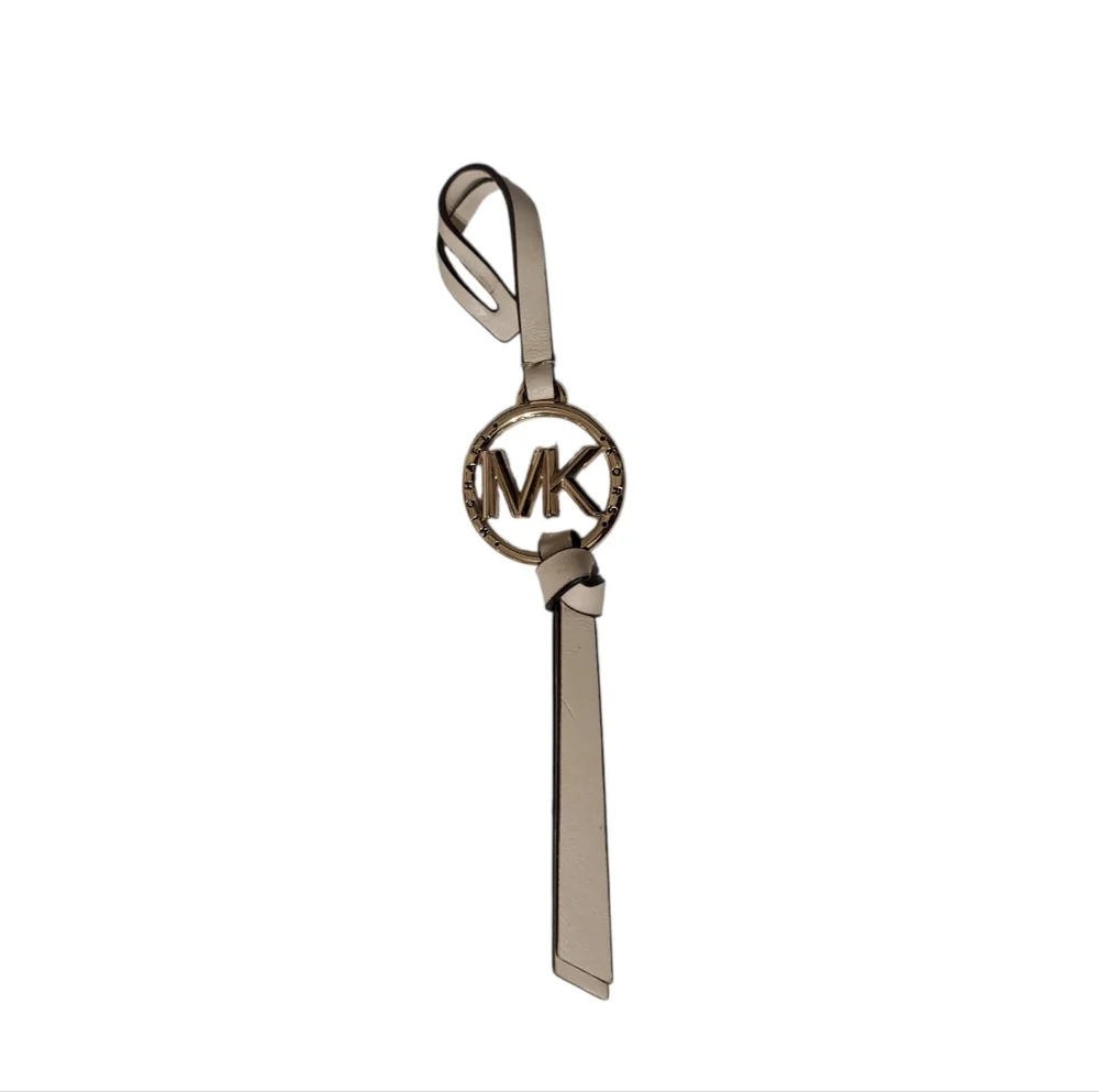 Michael Kors Hanging MK Charm Gold Tone With Cream Leather